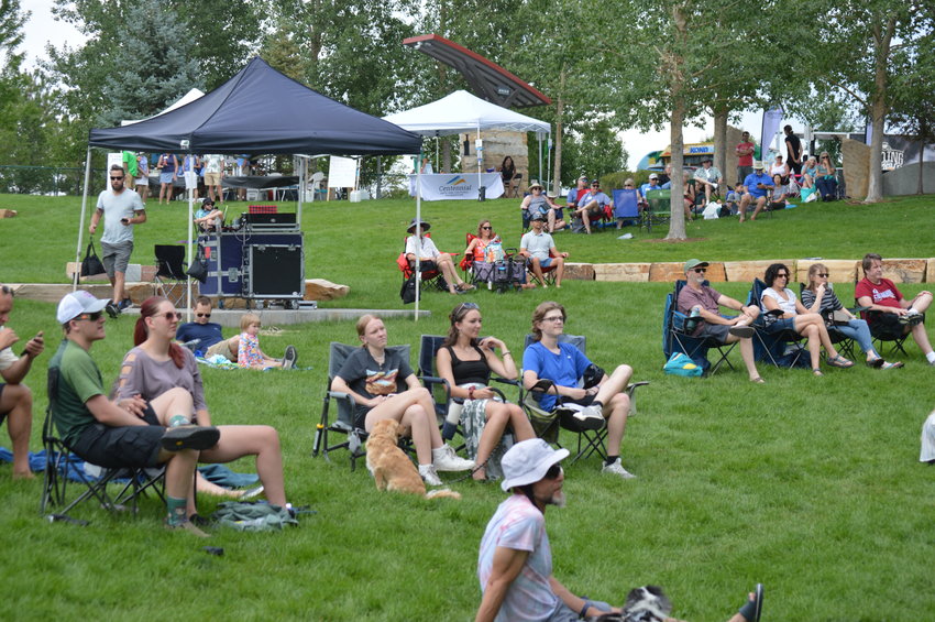 People attending the free concert on July 31, 2022, brought their own chairs and blankets and scattered throughout the field at Centennial Center Park.